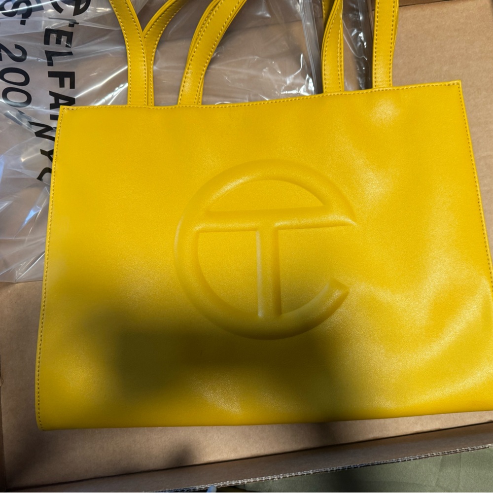 Medium Mustard Telfar shopping bag. Great condition.